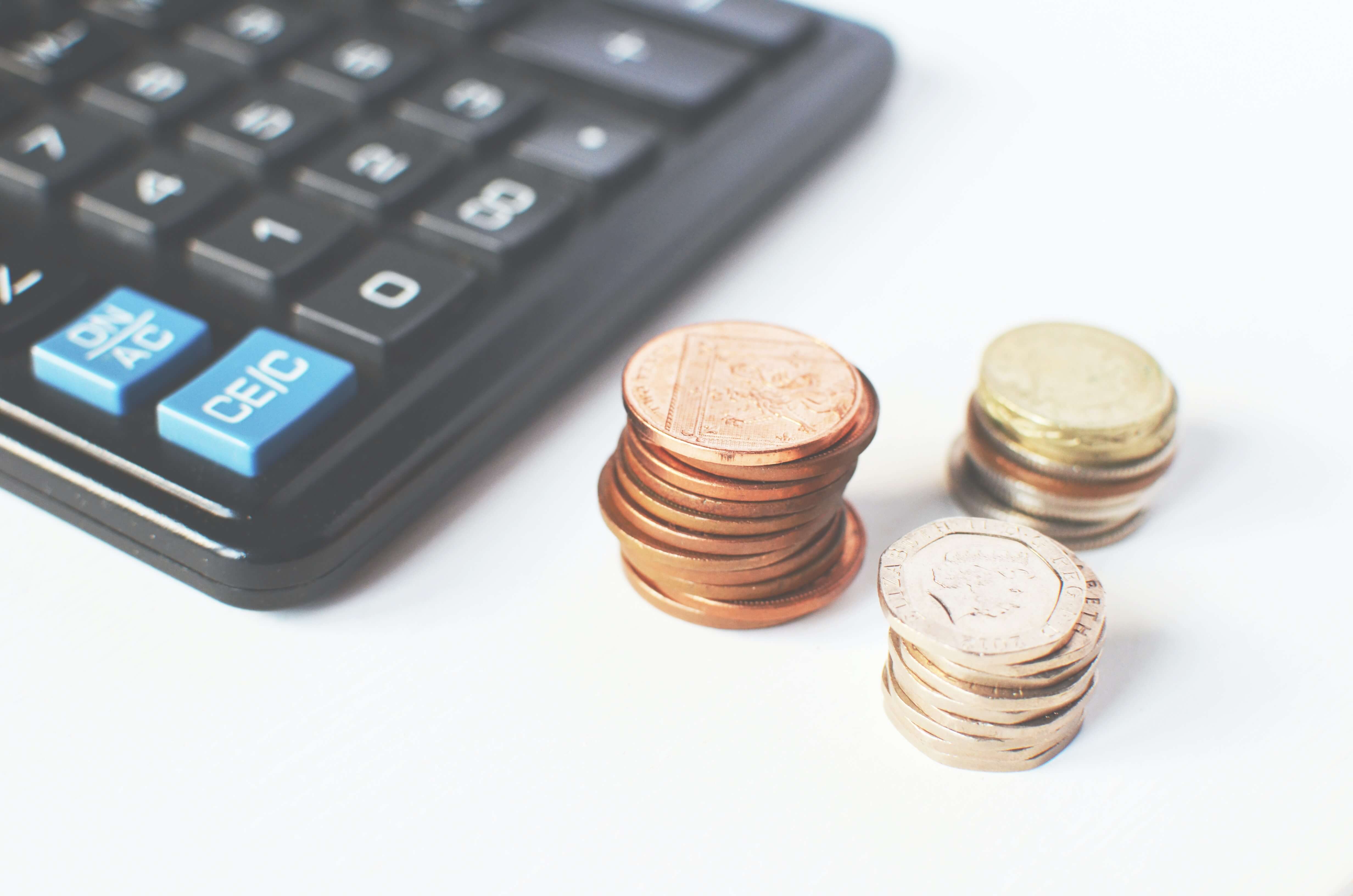 Pound sterling, pennies and a calculator