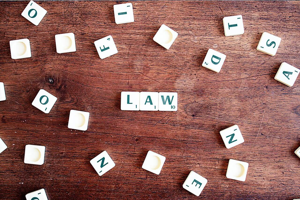 Scrabble letters spelling LAW